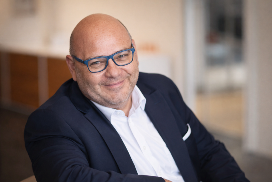 Coaching-Gespräch zwischen einer Beraterin und einem Führungskraft-Klienten